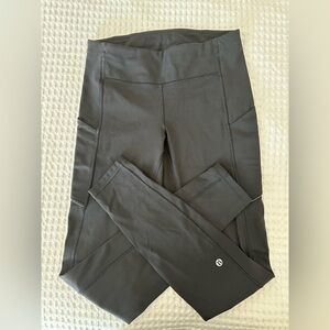Lululemon black running leggings with side and back pockets